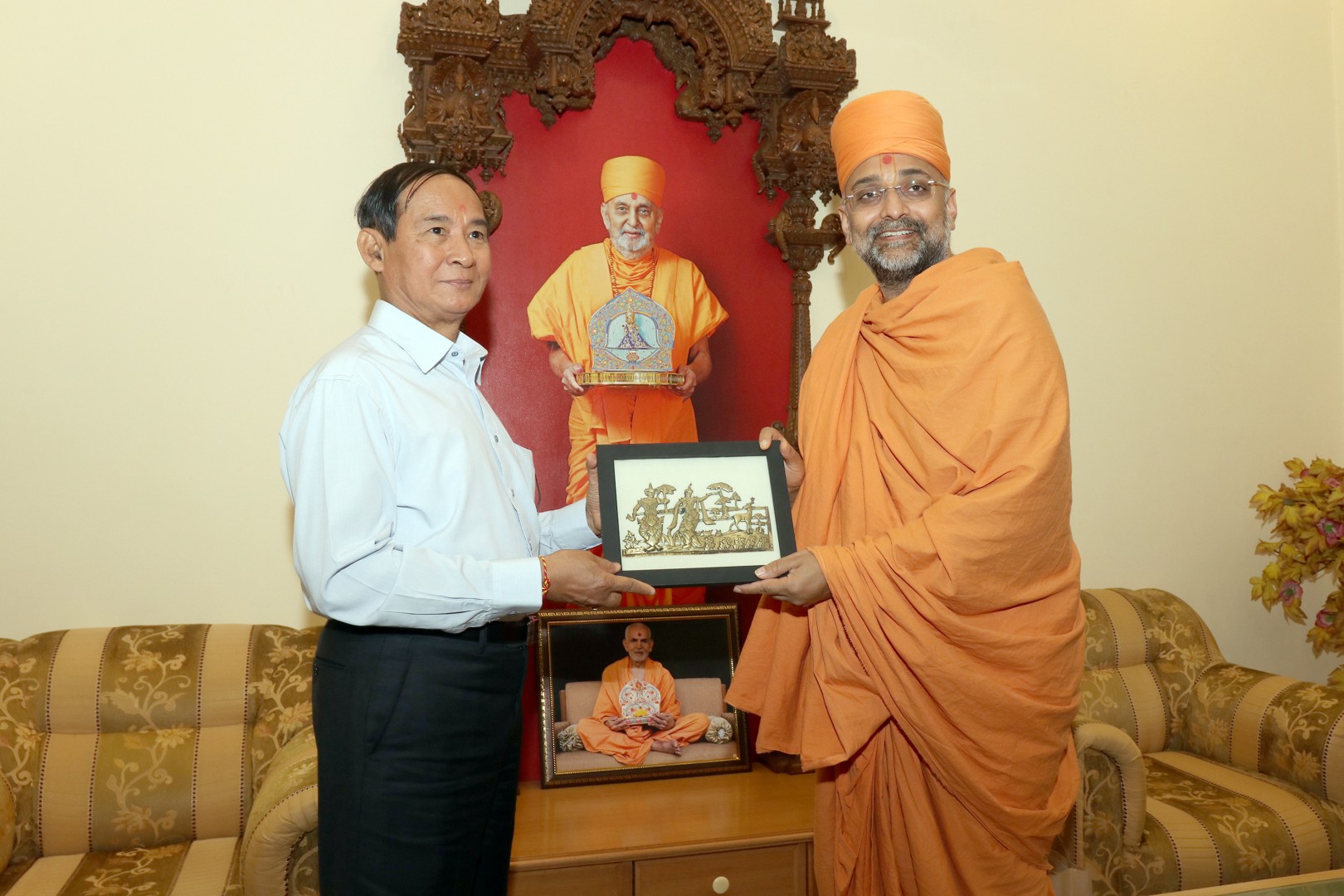 President Myint presents a gift depicting a scene of Rama chasing the demon Macricha in the form of a golden deer in the Myanmar’s national epic called "Yama Zatdaw", the Burmese version of the Ramayana